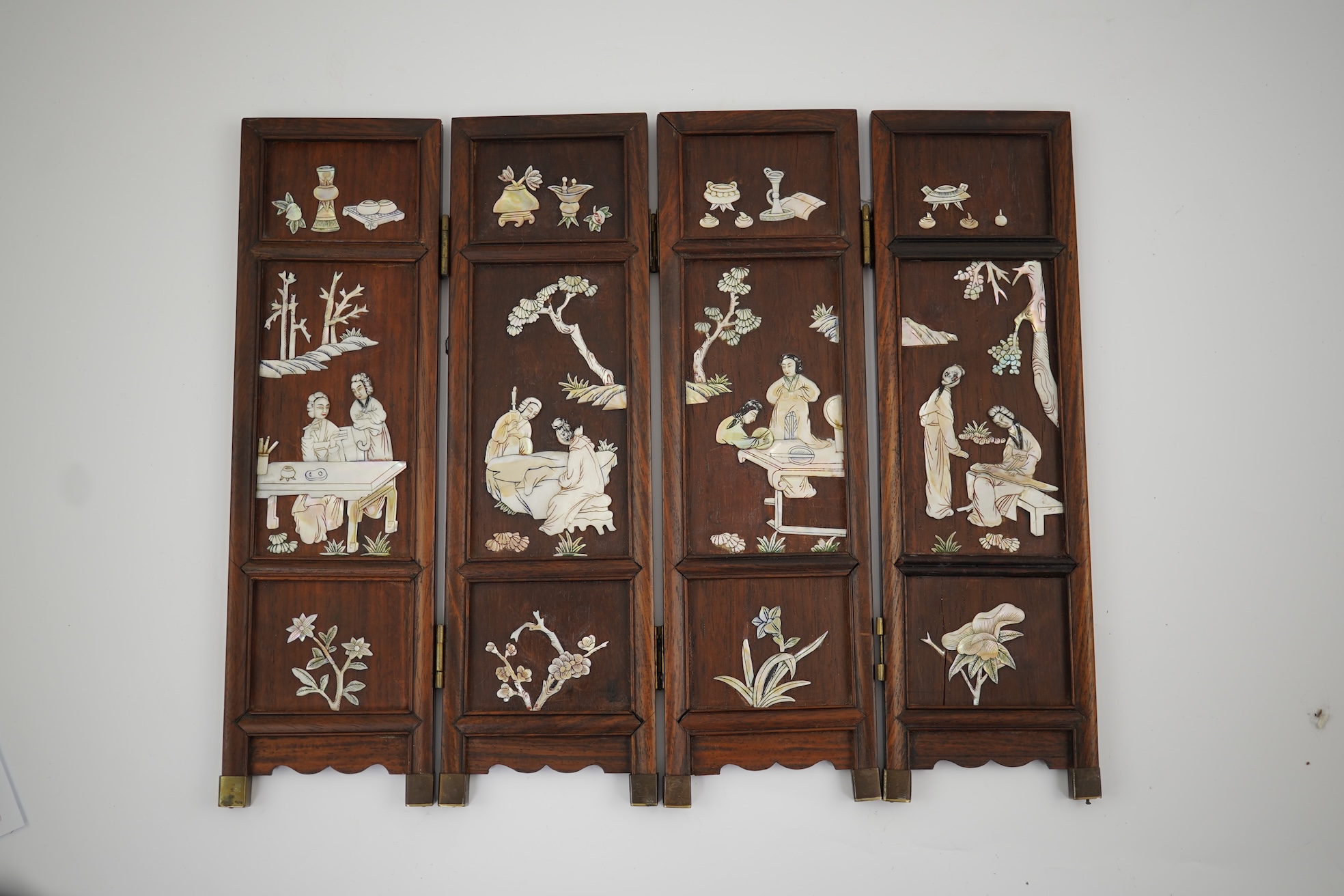 A Chinese mother-of-pearl overlaid hardwood miniature table screen, 19th century